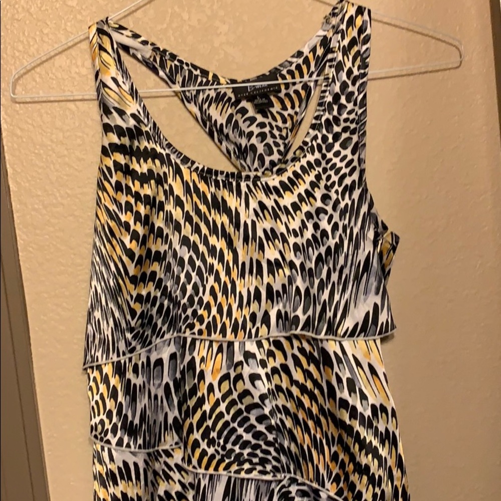 Pretty tank top. T back with tail. Gently used.